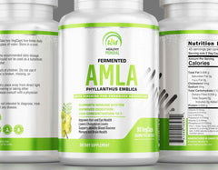 Close-up of Amla supplement bottle with capsules, emphasizing the antioxidant-rich Indian gooseberry extract for health benefits.